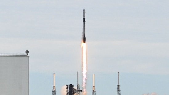 SpaceX Falcon 9 rocket topped with the Crew Dragon capsule lifts off for NASA's SpaceX Crew-13 mission from Space Launch Complex 40 at Cape Canaveral, Florid. (AFP)