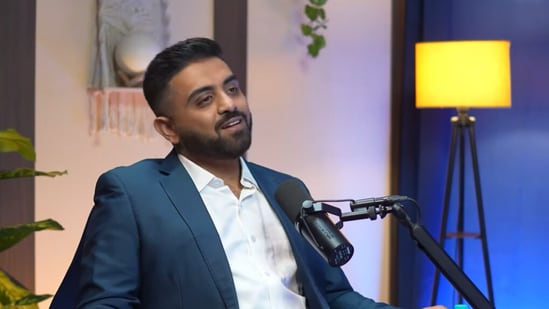 Indian pilot Smit Machchhar, being hailed as a hero for saving passengers after he was stabbed by his first officer in an alleged attempt to crash a flydubai plane on Wednesday (Screen grab from YouTube podcast)
