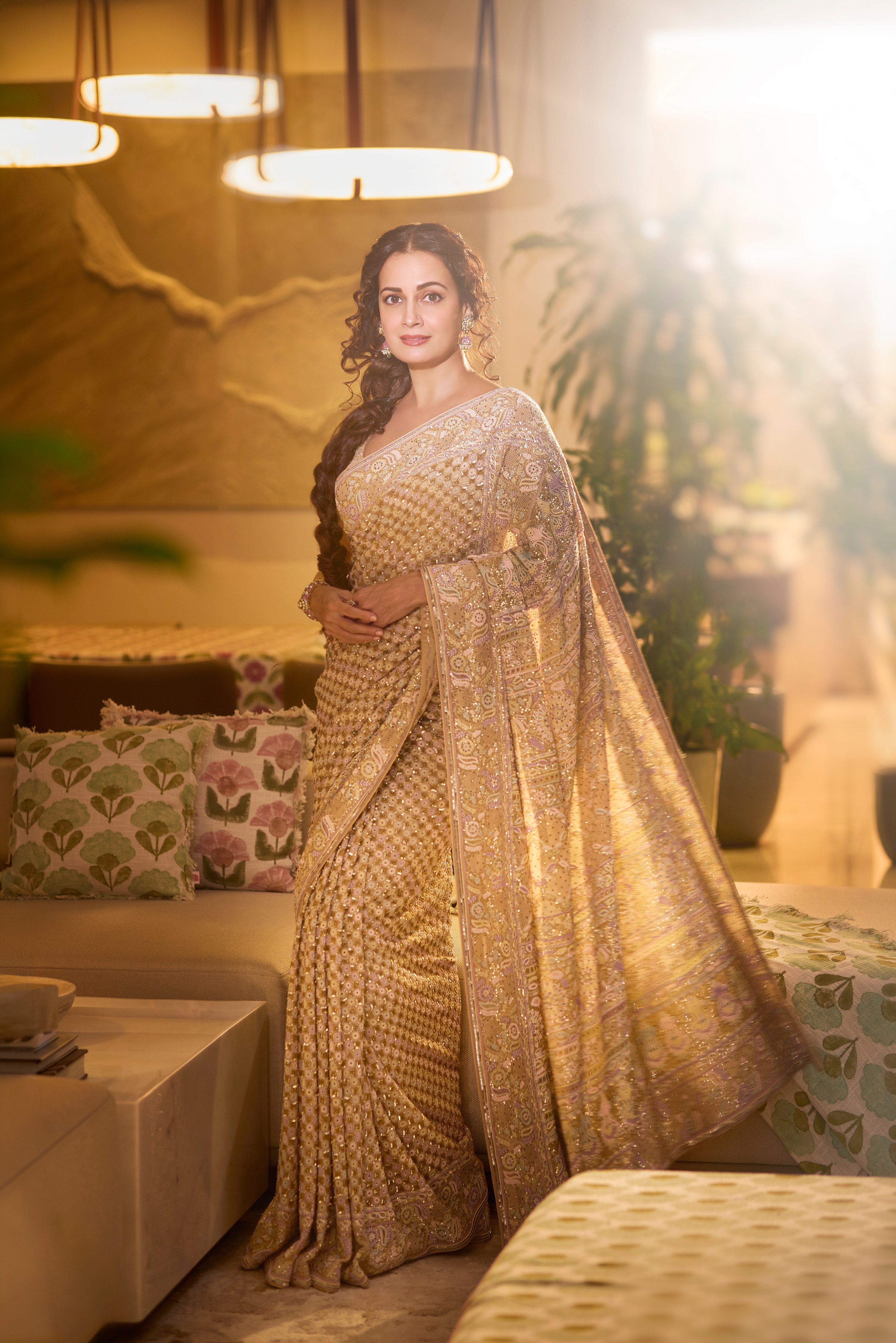 The actor wears an Anjul Bhandari georgette saree with do taar Chikankari and multicolor Japanese beads, paired with elegant earrings from Manubhai Jewellers.