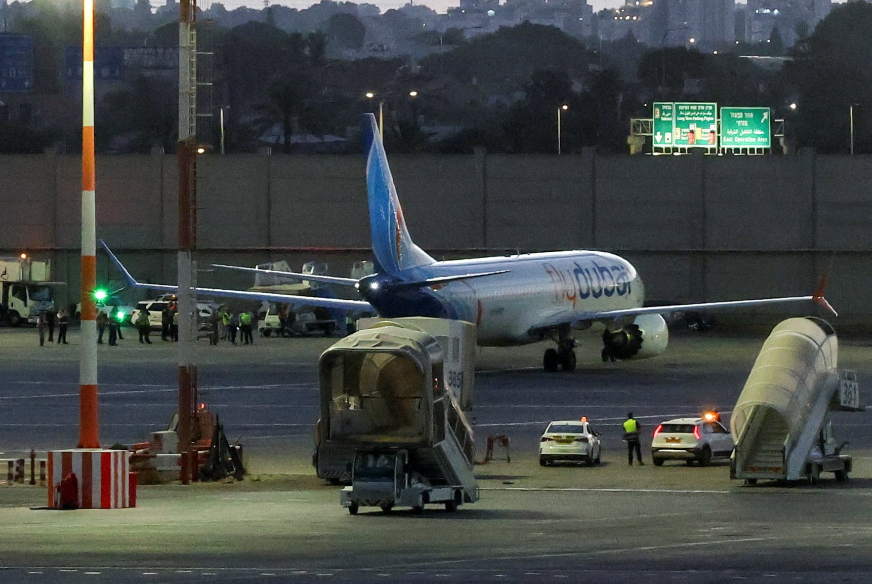 A plane, carrying passengers who were on the FlyDubai aircraft bound for Israel from the United Arab Emirates, which was diverted to Saudi Arabia following an emergency signal, arrives at the Ben Gurion International Airport, in Lod, near Tel Aviv, Israel, on September 30. (REUTERS)