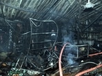 A quick commerce company’s godown in Niti Khand, Indirapuram, where fire broke out on Thursday. (Sakib Ali / Hindustan Times)