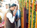 Uttarakhand Chief Minister Pushkar Singh Dhami pays tribute to who made the supreme sacrifice on the anniversary of the Rampur firing incident at the Martyrs' Memorial, in Dehradun on Friday.(@pushkardhami X)