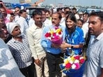 Athlete Parul Chaudhary being welcomed in Meerut on Friday (HT Photo)
