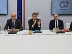 French President Emmanuel Macron (C) speaks following a video conference with G7 leaders who were holding talks on October 2, 2026, to coordinate action on tackling high fuel prices.
