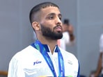 India’s Sujeet Kalkal after winning gold in the men’s 65kg freestyle wrestling at the Asian Games on Friday. (TV grab)