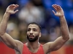 Nagoya: India's Sujeet Kalkal celebrates after winning gold medal in the men's Freestyle 65 kilogram final bout 196 wrestling event in the ongoing Asian Games 2026, in Nagoya, Japan, Friday, Oct. 2, 2026. (PTI Photo/Arun Sharma) (PTI10_02_2026_000289A) (PTI)