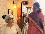 Neighbours Payal and Ruchi tactfully admire each other’s doorway, agreeing to pose beside one for a portrait. (HT Photo)