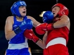 India's Parveen Hooda (L) won gold on Friday.