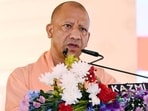 UP CM Yogi Adityanath said PM Modi would complete 25 years in public service as Gujarat chief minister and Prime Minister on October 7, describing the journey as one of service “without stopping, bowing or wavering”. (HT file)