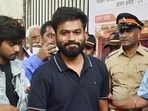 Cockroach Janta Party Founder Abhijeet Dipke arrives at the Press Club for a press conference , in Mumbai on Thursday.