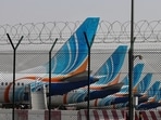 FlyDubai planes at Dubai International Airport. The airline has suspended its flights to Israel while the probe continues.