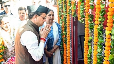 Uttarakhand Chief Minister Pushkar Singh Dhami pays tribute to who made the supreme sacrifice on the anniversary of the Rampur firing incident at the Martyrs' Memorial, in Dehradun on Friday. (@pushkardhami X)