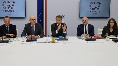French President Emmanuel Macron (C) speaks following a video conference with G7 leaders who were holding talks on October 2, 2026, to coordinate action on tackling high fuel prices. (via REUTERS)