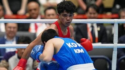 India's Ankush, in red, and South Korea's Kim Min-seong, in action in the men’s 80kg final. (AP Photo/Lee Jin-man) India's Ankush, in red, and South Korea's Kim Min-seong, in action in the men’s 80kg final. (AP Photo/Lee Jin-man)