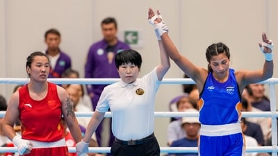 India's Lovlina Borgohain, in blue, celebrates after winning gold medal. (PTI) India's Lovlina Borgohain, in blue, celebrates after winning gold medal. (PTI)