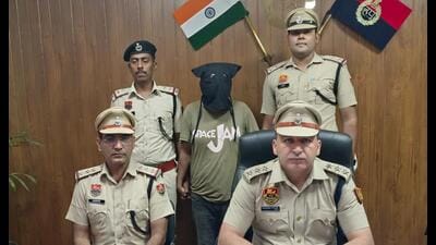 The suspect as Akhil Maurya in police custody. The suspect as Akhil Maurya in police custody.