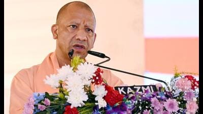 UP CM Yogi Adityanath said PM Modi would complete 25 years in public service as Gujarat chief minister and Prime Minister on October 7, describing the journey as one of service “without stopping, bowing or wavering”. (HT file) UP CM Yogi Adityanath said PM Modi would complete 25 years in public service as Gujarat chief minister and Prime Minister on October 7, describing the journey as one of service “without stopping, bowing or wavering”. (HT file)