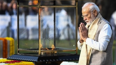 Prime Minister Narendra Modi pays homage to Mahatma Gandhi at Rajghat on Gandhi Jayanti, in New Delhi on Friday. (ANI) Prime Minister Narendra Modi pays homage to Mahatma Gandhi at Rajghat on Gandhi Jayanti, in New Delhi on Friday. (ANI)