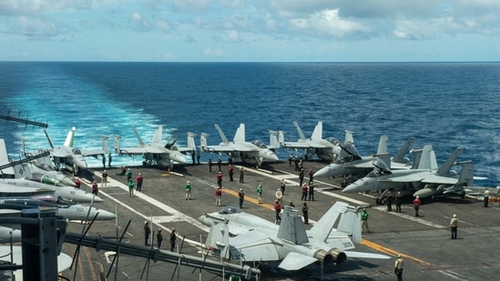 File photo of USS Theodore Roosevelt in the South China Sea.(U.S. Navy via AP)