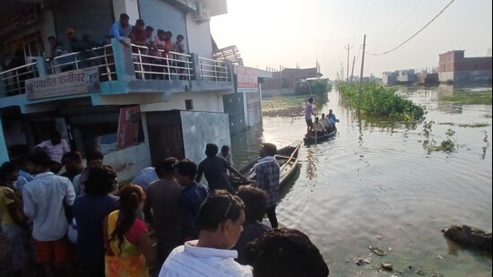 Floodwaters surged back into narrow lanes and modest homes on Friday. (Deepak Gupta/HT Photo)