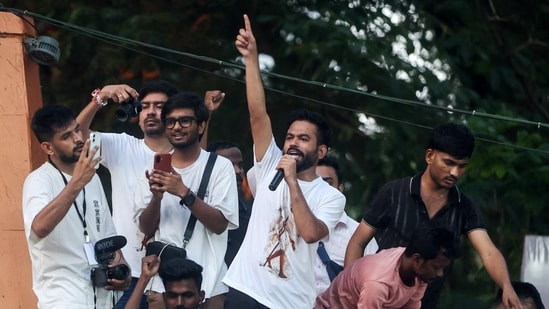 CJP protest highlights: Abhijeet Dipke, head of the Cockroach Janta Party (CJP), speaks during a protest demanding the resignation of Chief Election Commissioner Gyanesh Kumar, at Shivaji Park in Mumbai.