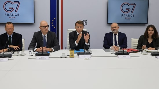 French President Emmanuel Macron (C) speaks following a video conference with G7 leaders who were holding talks on October 2, 2026, to coordinate action on tackling high fuel prices.