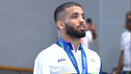 India’s Sujeet Kalkal after winning gold in the men’s 65kg freestyle wrestling at the Asian Games on Friday. (TV grab)