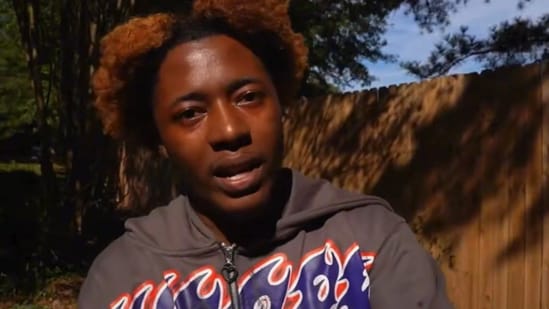 Reggie linked a claimed YoungBoy music ban to Kai Cenat and Gigi, but the allegation has not been independently confirmed.(Reggie/YouTube)