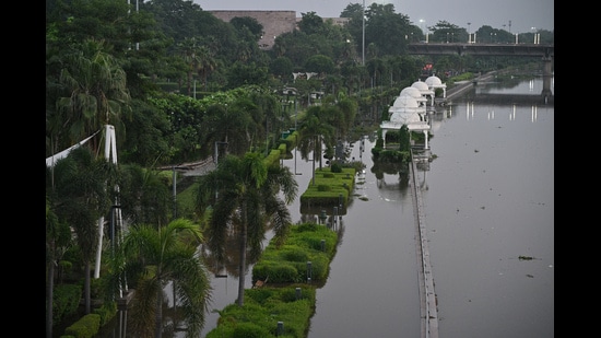 The impact of the rising river was clearly visible at the Gomti Riverfront, where water had spread over large sections of the normally accessible area. (Deepak Gupta/HT Photo)