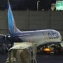 People disembark from a FlyDubai carrying Israeli passengers who had earlier been aboard another FlyDubai aircraft that made an emergency landing in Saudi Arabia approaches Ben Gurion International Airport near Tel Aviv, Israel, Wednesday, Sept. 30, 2026. (AP Photo/Ariel Schalit)