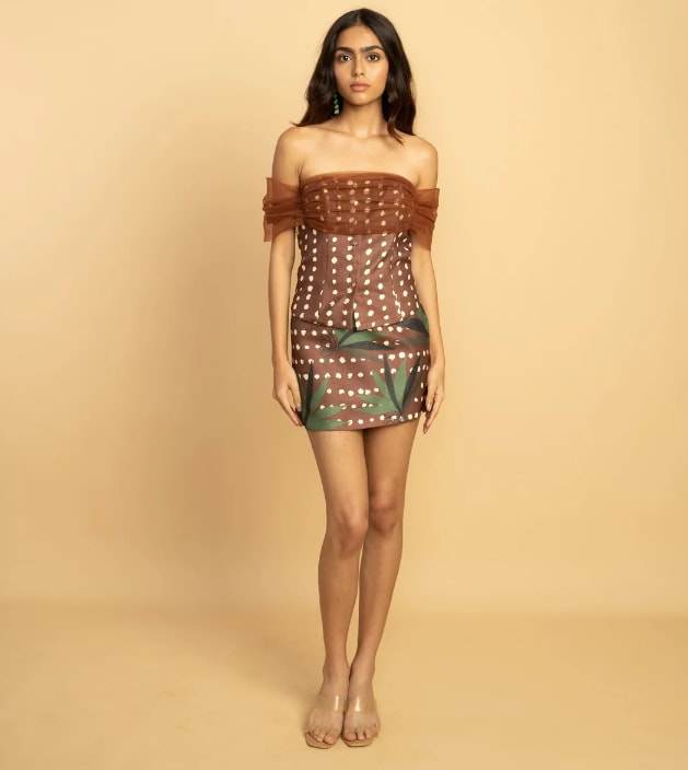 Mocha polka set comes with a corset top and a structured mini skirt. (Shop Samae)