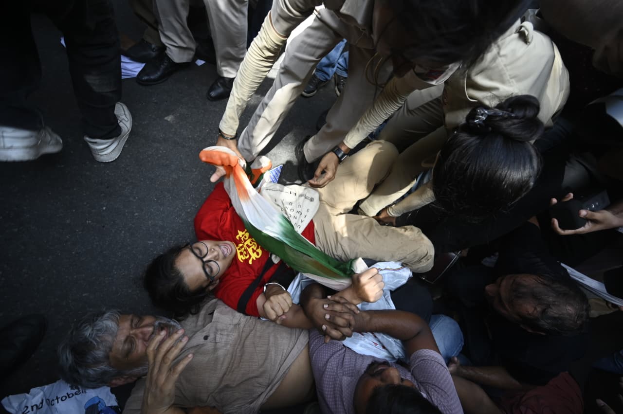 Delhi police officals detained AISA President Neha Bora and activist Yogendra Yadav at Jantar Mantar in New Delhi. (HT photo) Delhi police officals detained AISA President Neha Bora and activist Yogendra Yadav at Jantar Mantar in New Delhi. (HT photo)
