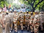 Security personnel stop protesters with barricades on a road near Jantar Mantar during a protest seeking Chief Election Commissioner Gyanesh Kumar's resignation over voter roll deletions, in New Delhi on Friday.(ANI)