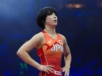 Akari Fujinami was pinned by North Korea’s Il Sim Son at the 2026 Asian Games. (UWW)