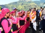Himachal CM Sukhvinder Singh Sukhu welcomed by the residents in Rampur on Friday. (HT Photo)