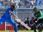 India's Abhishek Sharma in action against Pakistan during the Asian Games final. (AP Photo/AP Photo/Mark Baker))