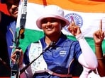 India's Kumkum Anil Mohod celebrates after winning the gold medal. (REUTERS)