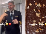 IndiGo captain cuts cake during his last flight.