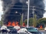 The Greer Fire Department has closed part of Wade Hampton Boulevard due to a large fire at M & M Waste Oil Service. 