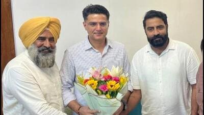 Three-time Jalandhar Cantonment MLA Pargat Singh (left), who was named Punjab Congress chief on Friday, greeting recently appointed Punjab party affairs in-charge Sachin Pilot (centre) in New Delhi on Saturday. (X) Three-time Jalandhar Cantonment MLA Pargat Singh (left), who was named Punjab Congress chief on Friday, greeting recently appointed Punjab party affairs in-charge Sachin Pilot (centre) in New Delhi on Saturday. (X)