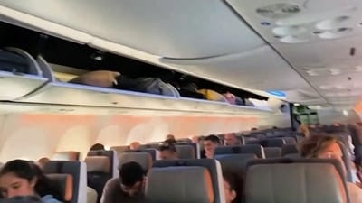 This screengrab shows passengers inside the rerouted flydubai flight FZ 1073, ahead of its departure to Tel Aviv from Saudi Arabia's Tabuk airport. (AFP) This screengrab shows passengers inside the rerouted flydubai flight FZ 1073, ahead of its departure to Tel Aviv from Saudi Arabia's Tabuk airport. (AFP)