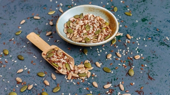 Seed cycling integrates flax, pumpkin, sesame, and sunflower seeds during specific menstrual phases. (Freepik)