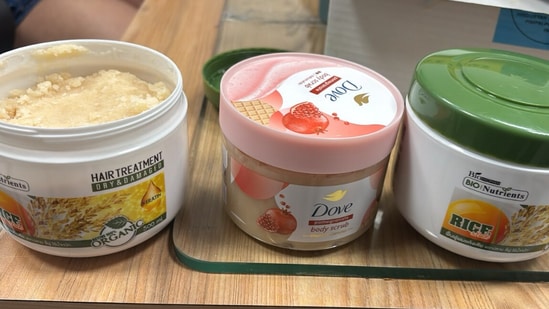 Officers allegedly found a waxy, semi-solid substance with a pungent odour concealed inside three commercial cosmetic containers.