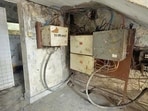 Across other sections of the building, dangling wires, deteriorating ceilings, and poorly kept rooms compound the hazardous environment. (HT)