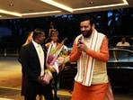 Haryana CM Nayab Singh Saini being welcomed on his arrival in Singapore on Sunday. (HT Photo)