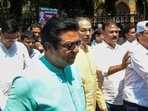 Shiv Sena (UBT) chief Uddhav Thackeray, MNS chief Raj Thackeray, and leaders from Congress and NCP (SP) lead the 'Virat Garjana Morcha' from Metro Cinema to the Brihanmumbai Municipal Corporation headquarters against Chief Election Commissioner (CEC) Gyanesh Kumar over alleged irregularities in the Special Intensive Revision (SIR) of electoral rolls, in Mumbai, Maharashtra, Sunday.
