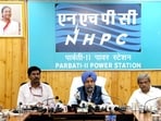 Ranjeet Singh (centre), GM of the NHPC Parbati-II power station, addressing the media on Saturday . (Aqil Khan/HT)