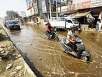 Sewerage water on Tajpur main road near dairy complex C block in Ludhiana on Saturday. (Gurpreet Singh/HT)