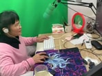 Zhong Juanjuan plays video games during a livestream.(South China Morning Post)