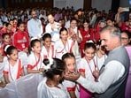 When a student asked whether he had ever thought of becoming CM during his school days, he said that the path was ahead shaped by one’s actions and hard work. (HT Photo)